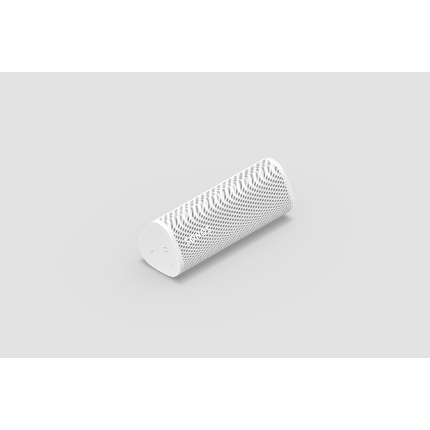 White Sonos speaker on a gray surface, cylindrical shape.