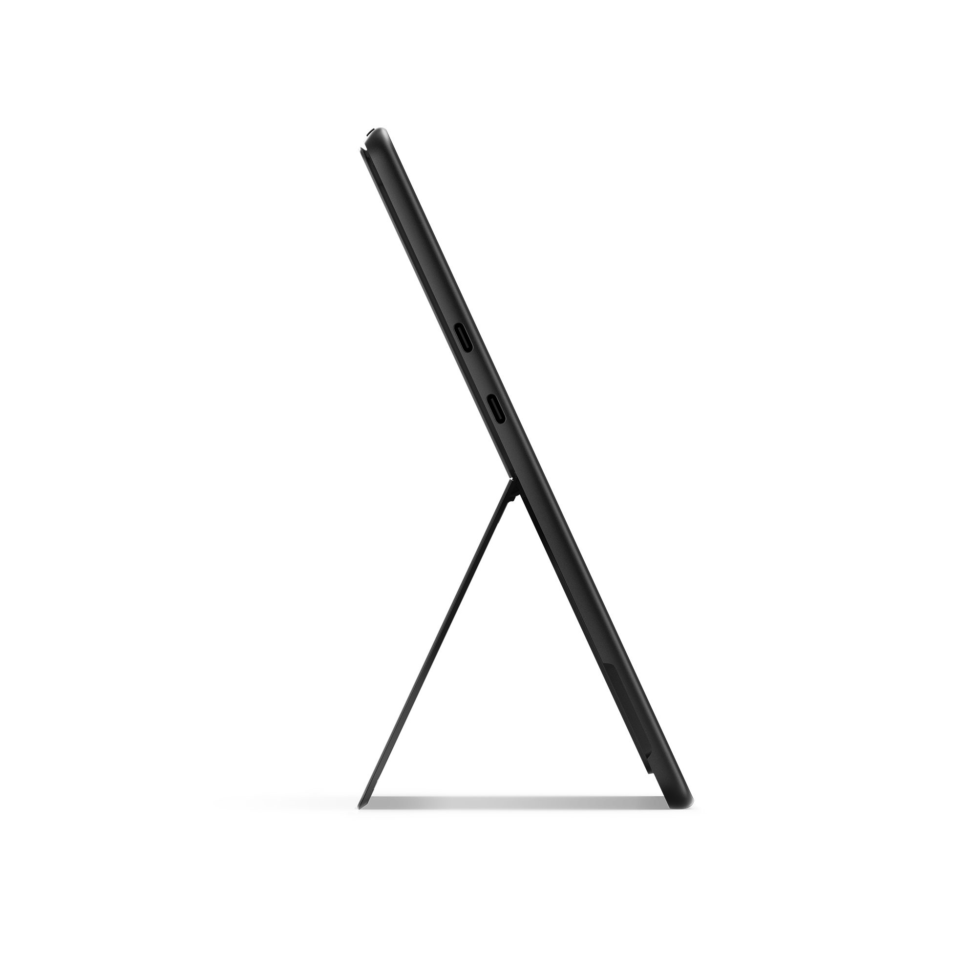 Ein schwarzes Tablet, Seitenansicht, mit einem Ständer aufgestellt, isoliert auf schwarzem Hintergrund.
