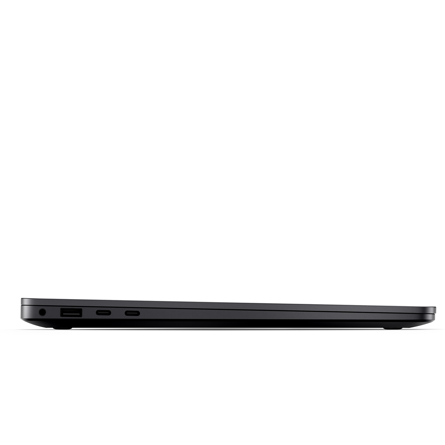Side view of a black laptop, showing ports and a closed lid. White background.