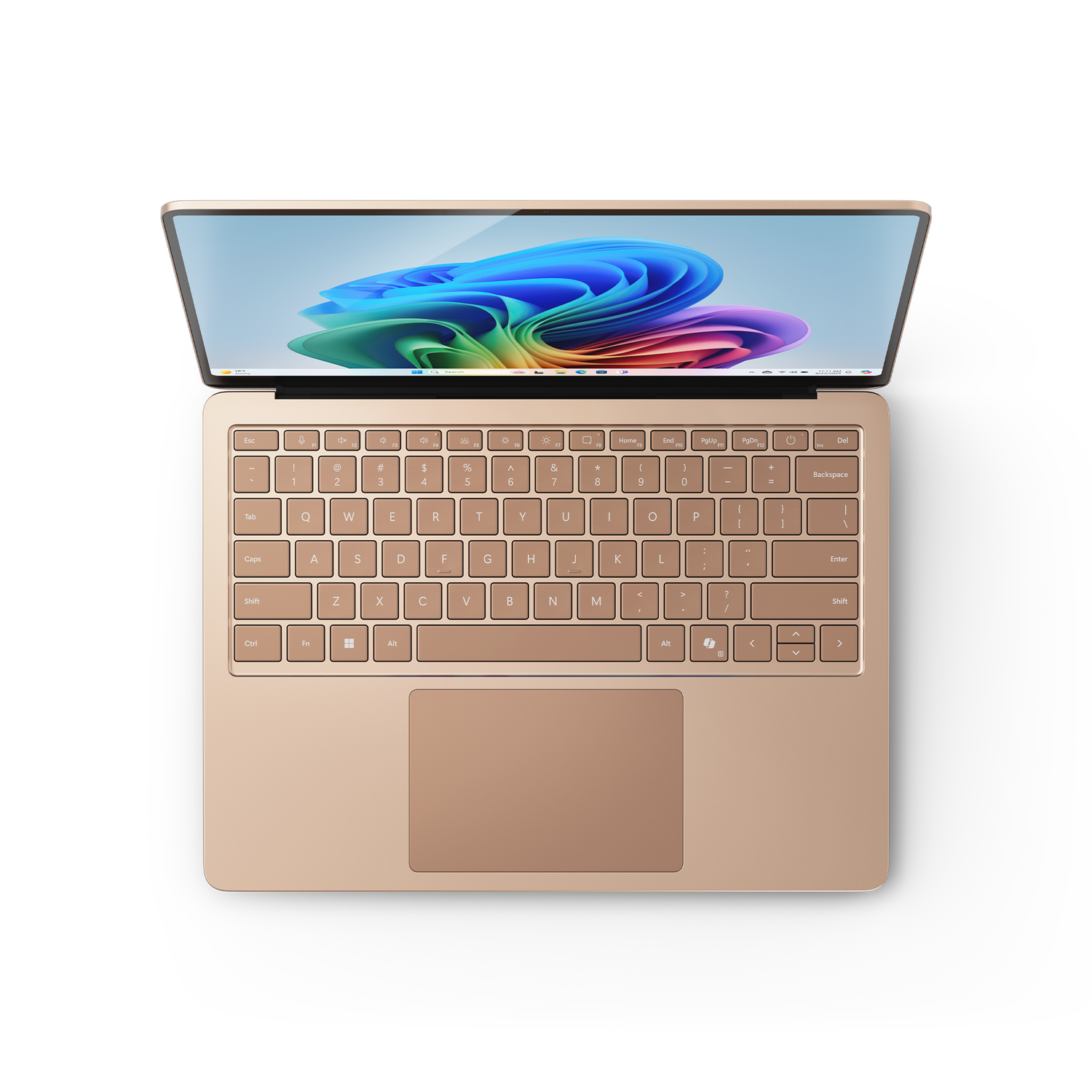 Gold laptop, open. Keyboard in view. Screen showing a colorful, abstract image.