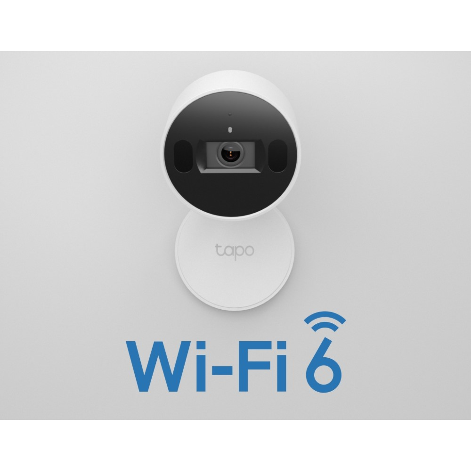 White Tapo Wi-Fi 6 security camera on a wall with the Wi-Fi 6 logo below it.