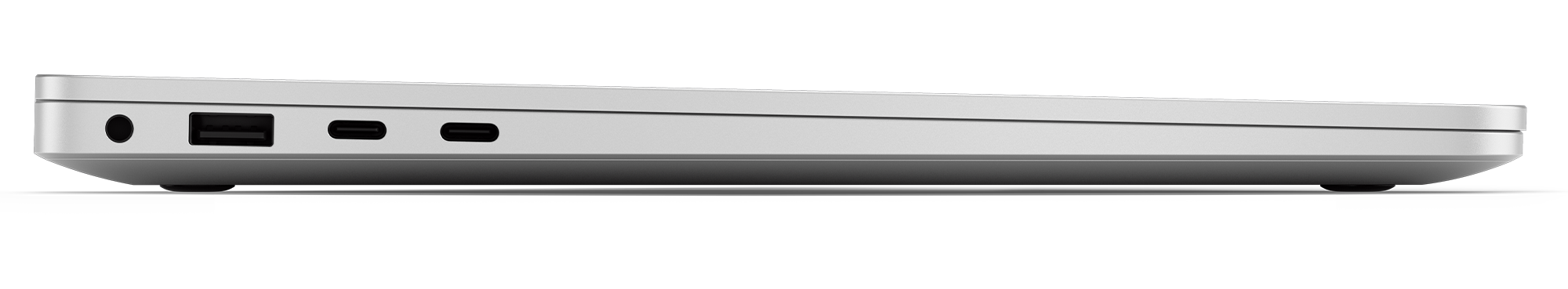 Widok z boku srebrnego laptopa z portami po lewej stronie.