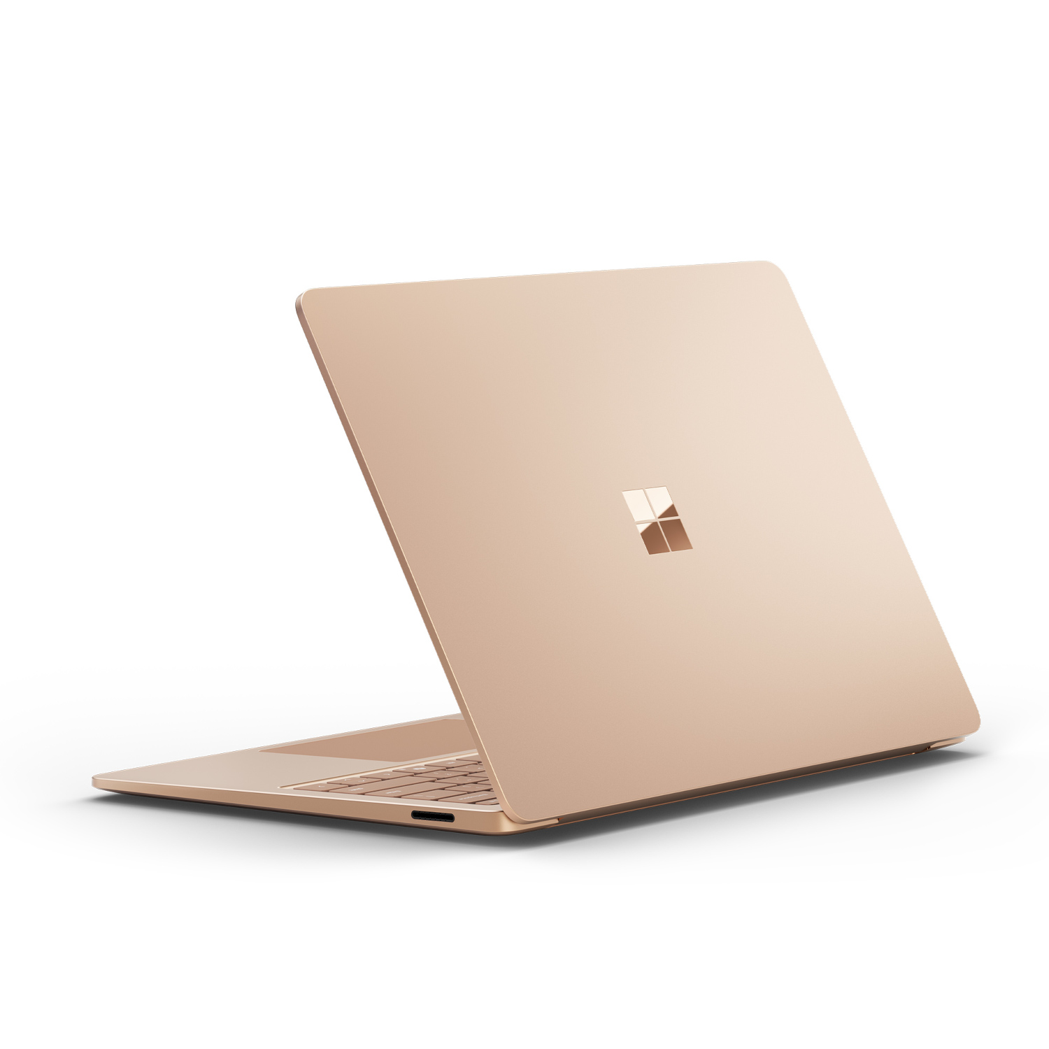 Gold laptop from the back. The screen is slightly open.
