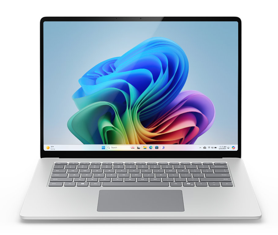 Otwarty srebrny laptop, wyświetlający kolorowe tło.