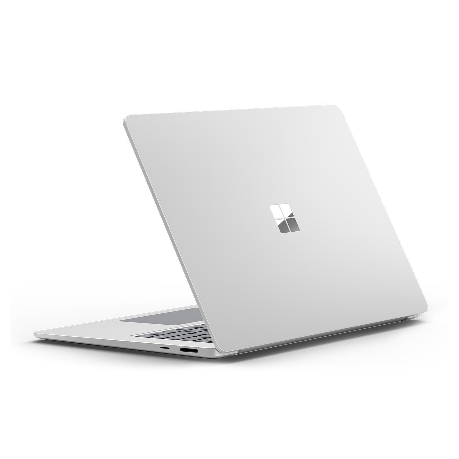Vista posteriore di un laptop argento con il logo Microsoft su sfondo bianco.