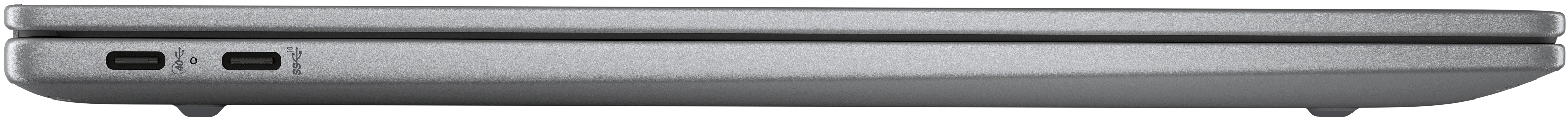 Nahaufnahme des Seitenprofils eines silbernen Laptops. Zwei USB-C-Anschlüsse sind links sichtbar.
