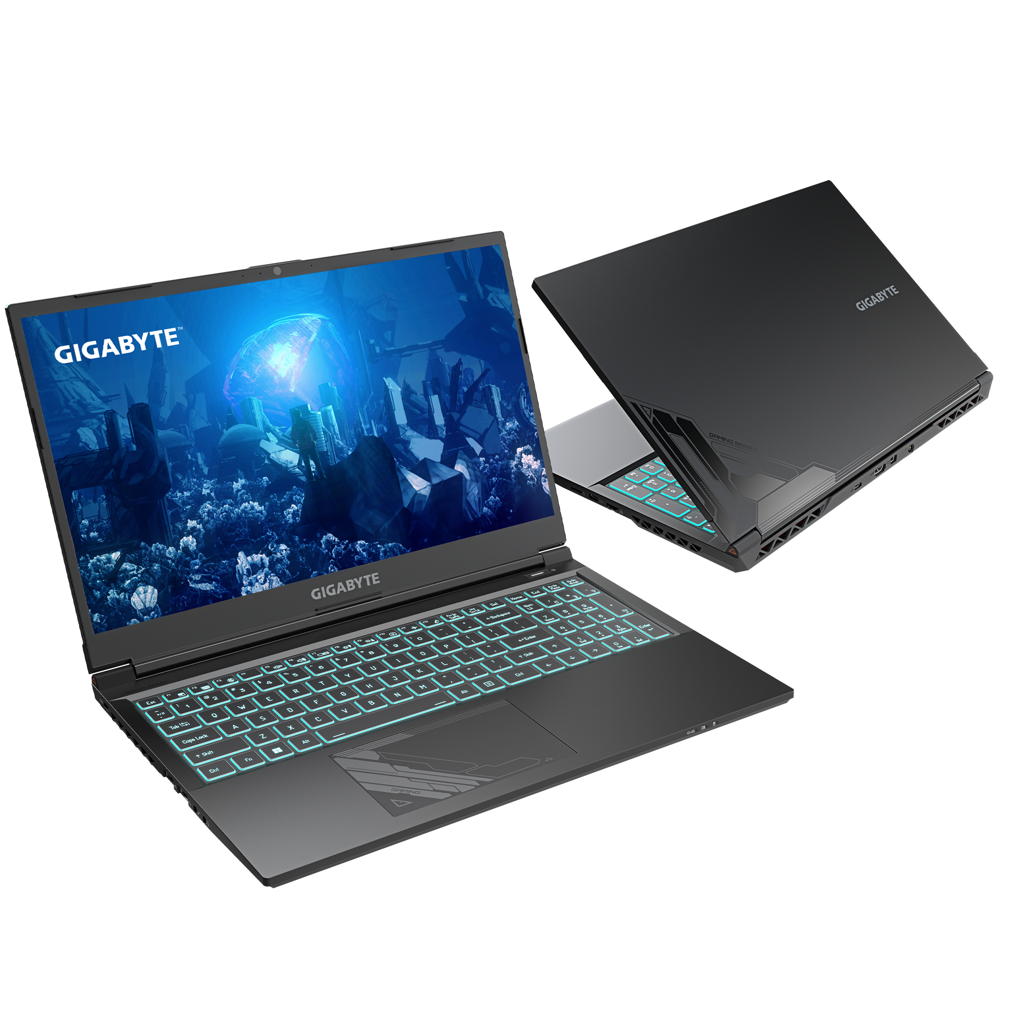 Ein Laptop mit beleuchteter Tastatur auf dunkler Oberfläche, ein weiterer Laptop dahinter.