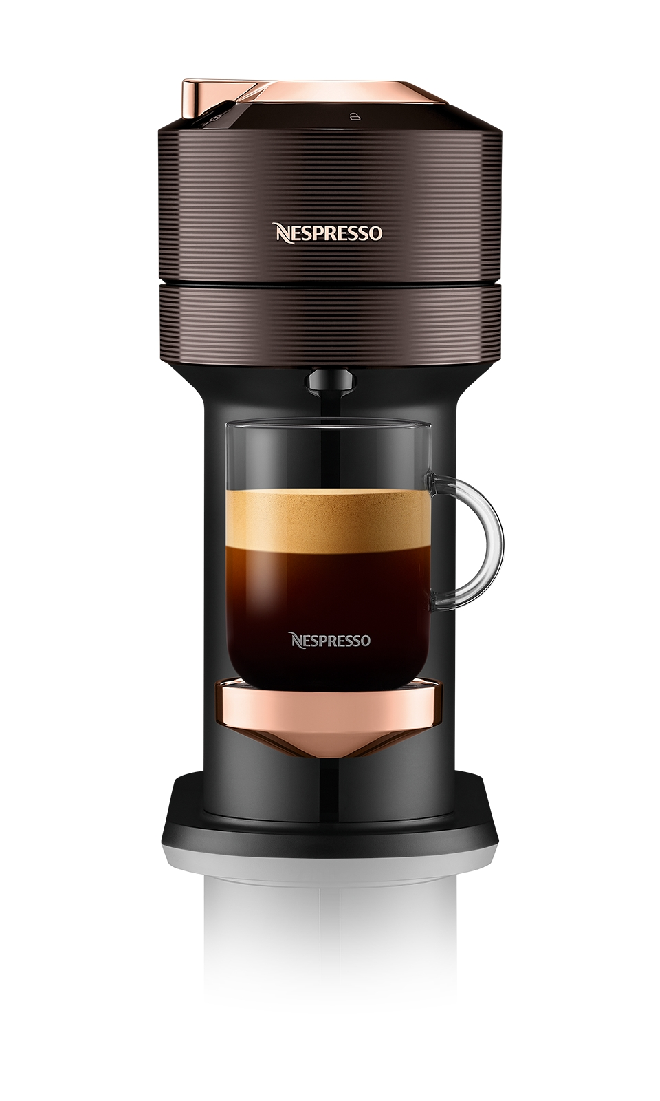 Nespresso kahve makinesi, kahve fincanı. Makine siyah ve kahverengi.
