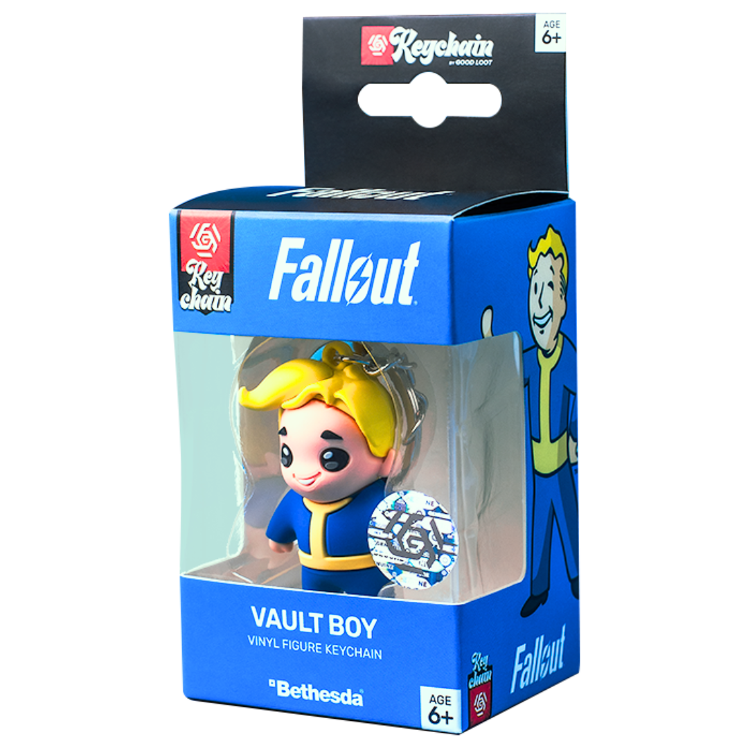Brelok Vault Boy w pudełku. Niebieskie pudełko z logo Fallout. Brelok to figurka Vault Boy. Wiek 6+.