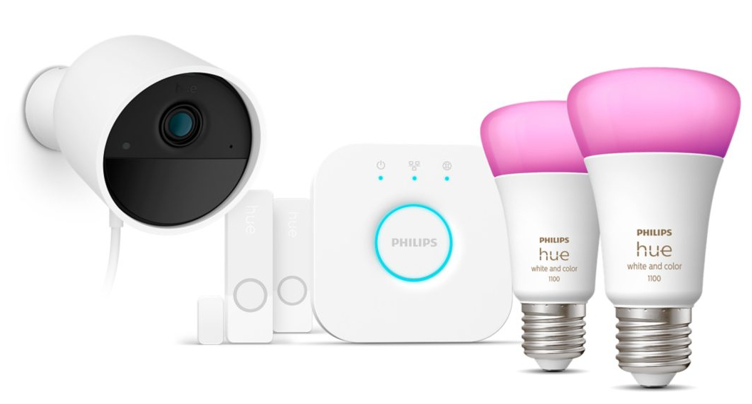 Kamera bezpieczeństwa, dwa czujniki drzwi, koncentrator i dwie inteligentne żarówki. Wszystko jest białe.
