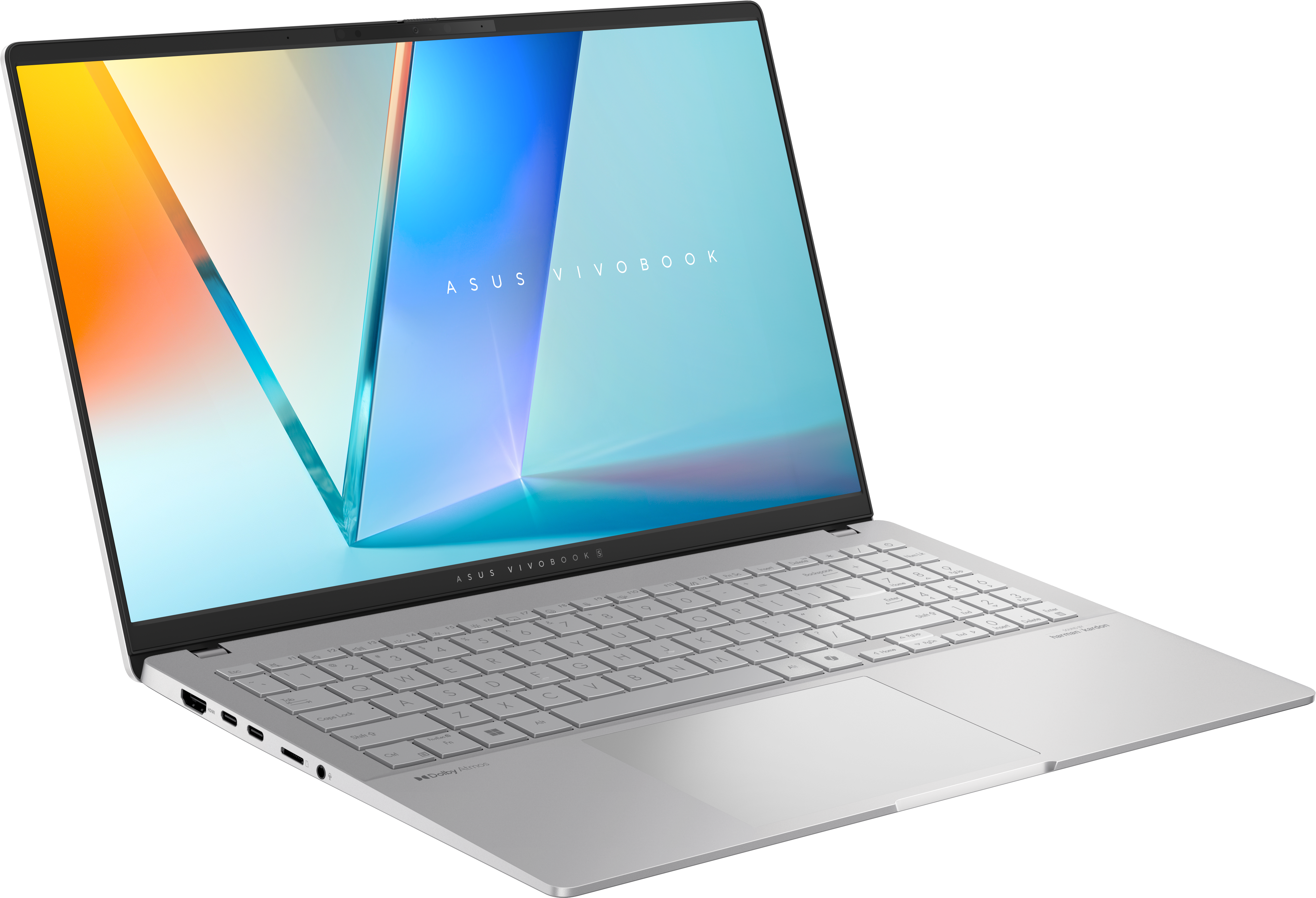 Ezüst laptop nyitva az asztalon, színes háttérrel a képernyőn.