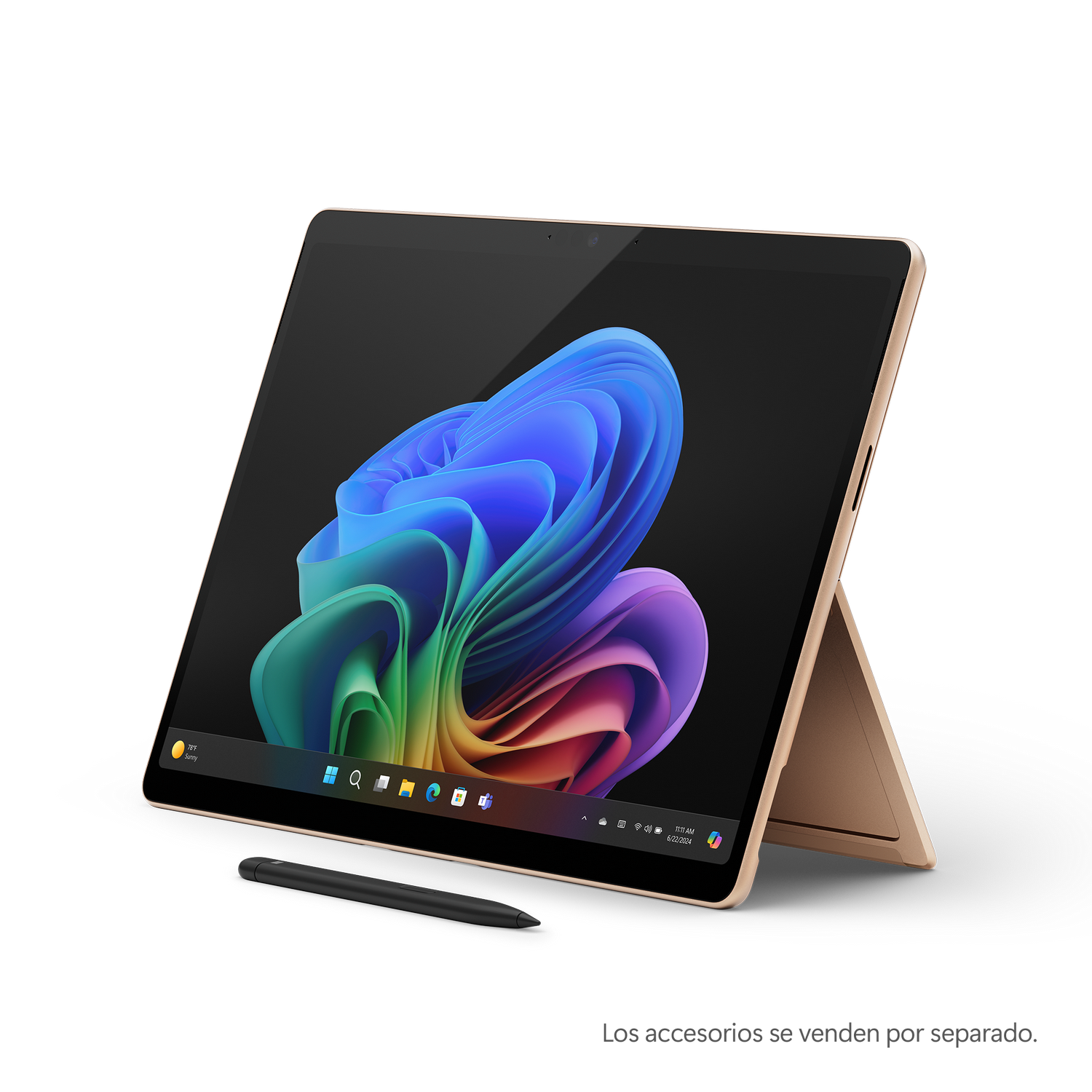 Tableta dorada con teclado, abierta. La pantalla muestra un diseño. Lápiz óptico en la parte inferior. Fondo negro.