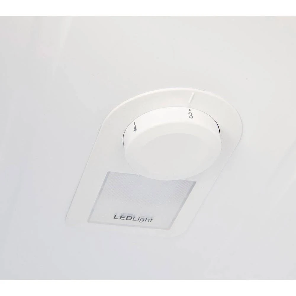 Panel de control blanco con un dial giratorio numerado del 1 al 4 y un indicador de luz LED.