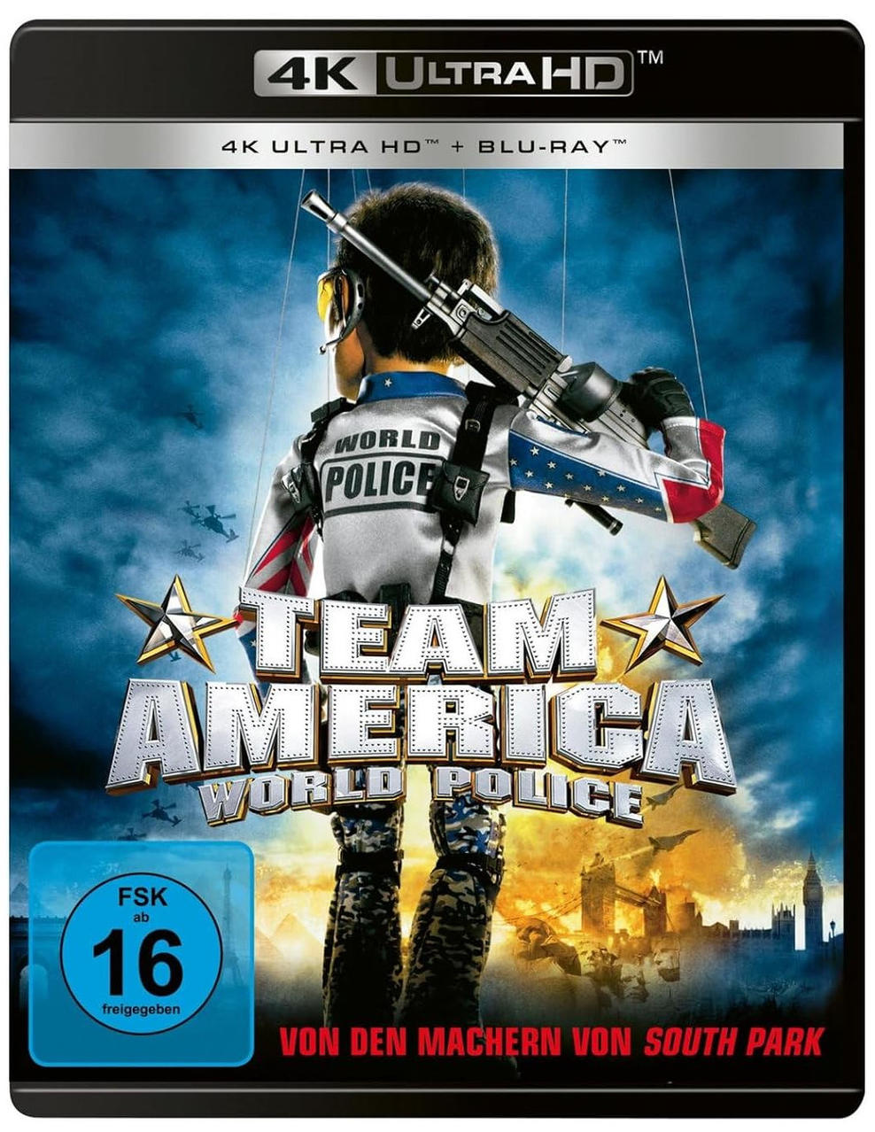 Filmcover mit einer Marionettenfigur, die eine Waffe hält. Der Filmtitel lautet 'TEAM AMERICA WORLD POLICE'.