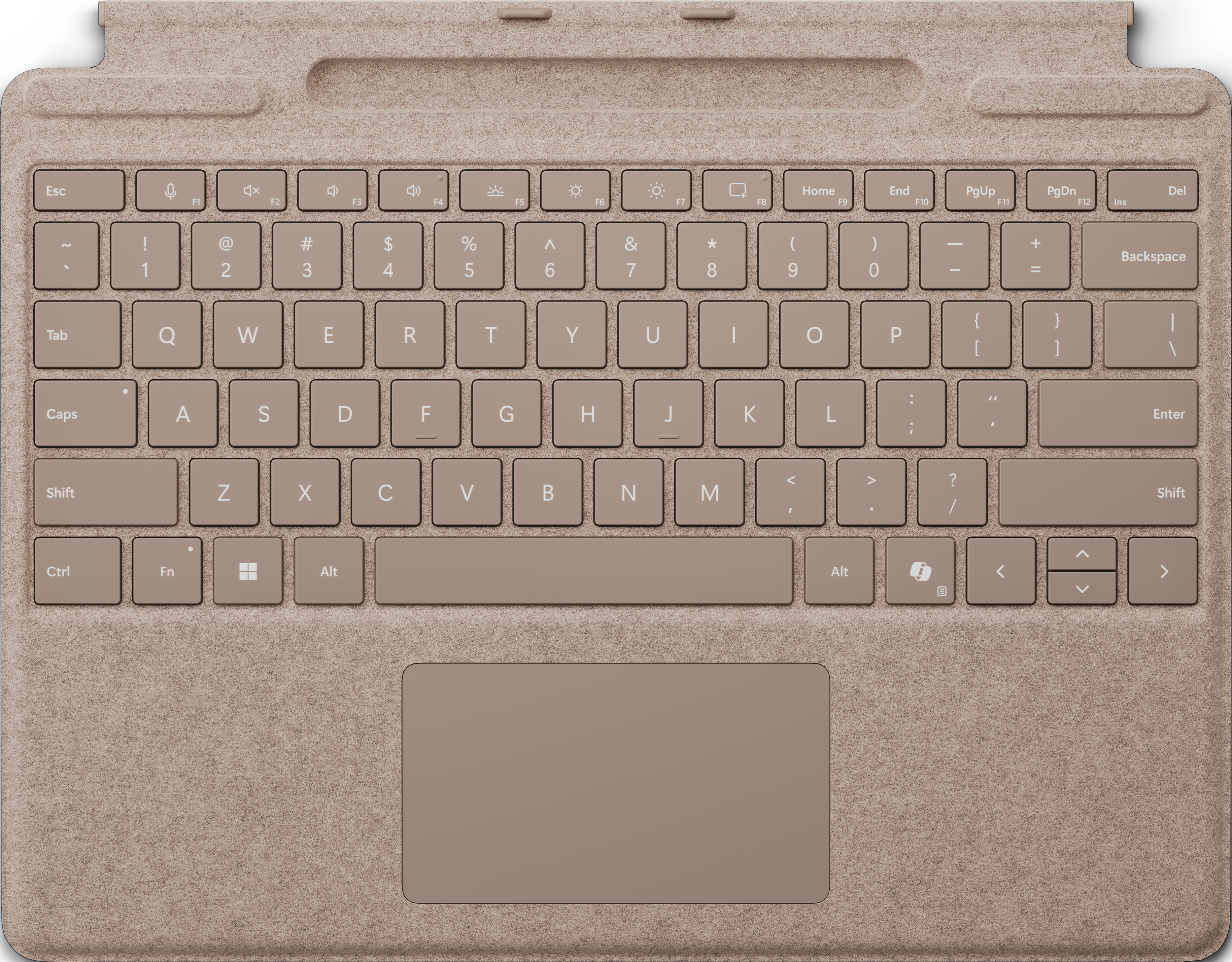 Gros plan sur un clavier beige avec des touches et un pavé tactile.