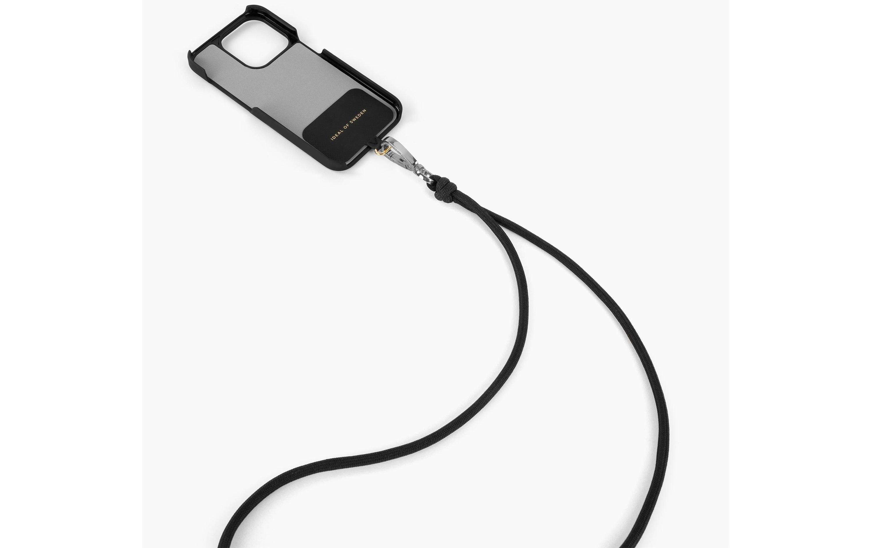 Custodia per telefono con cordino. Custodia nera con interno grigio. Cordino nero attaccato. Sfondo bianco.