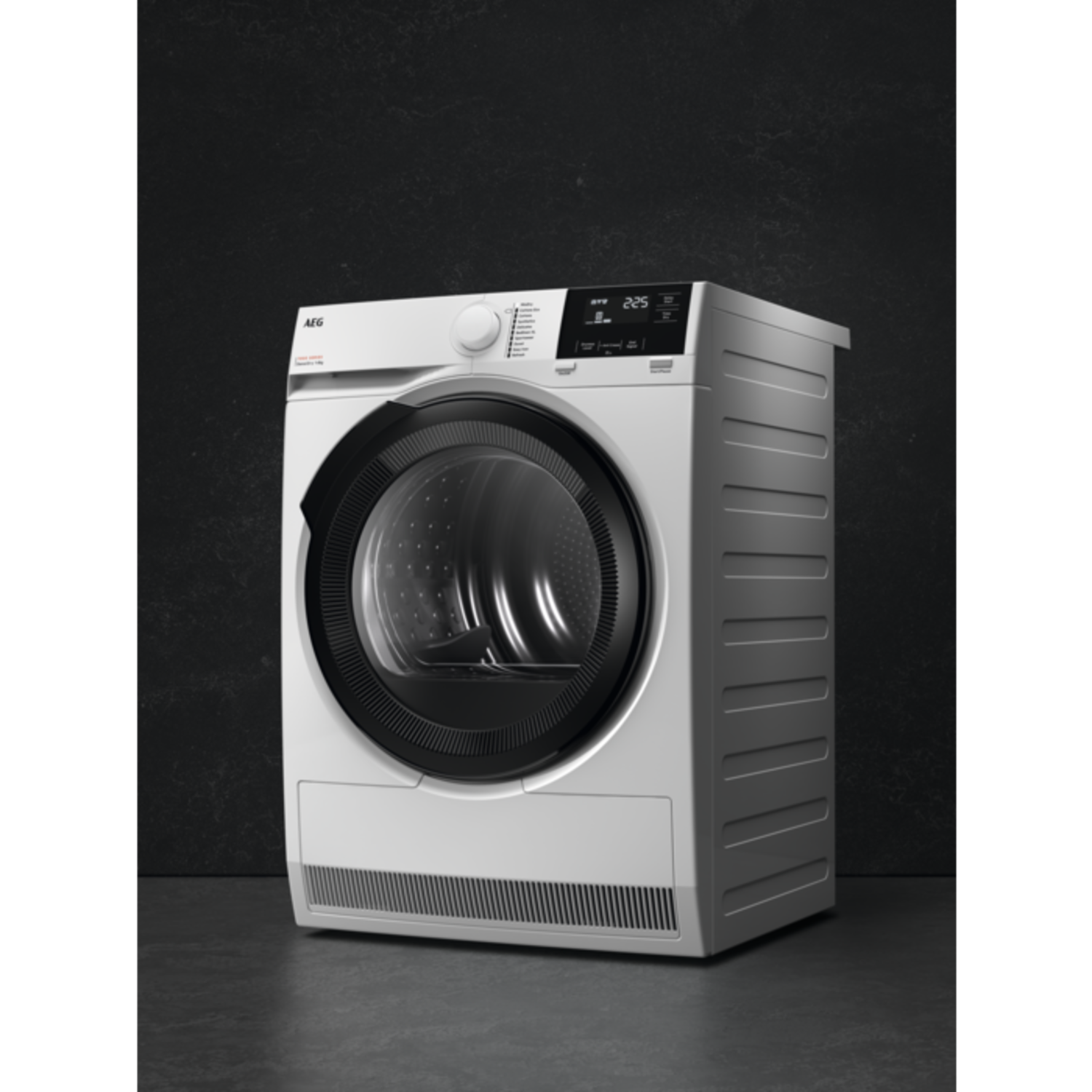 White AEG dryer on a dark background, angled view.