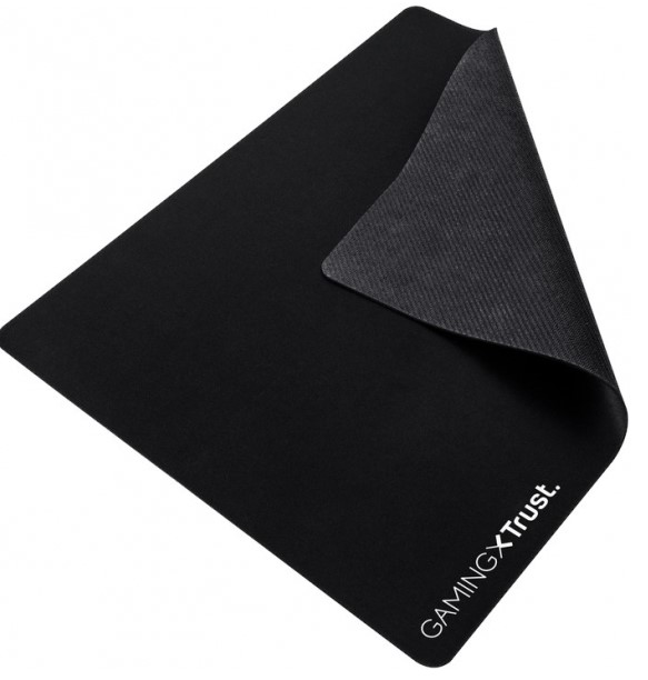 Siyah oyun mousepad'i. "GAMING X Trust" metni görünür.
