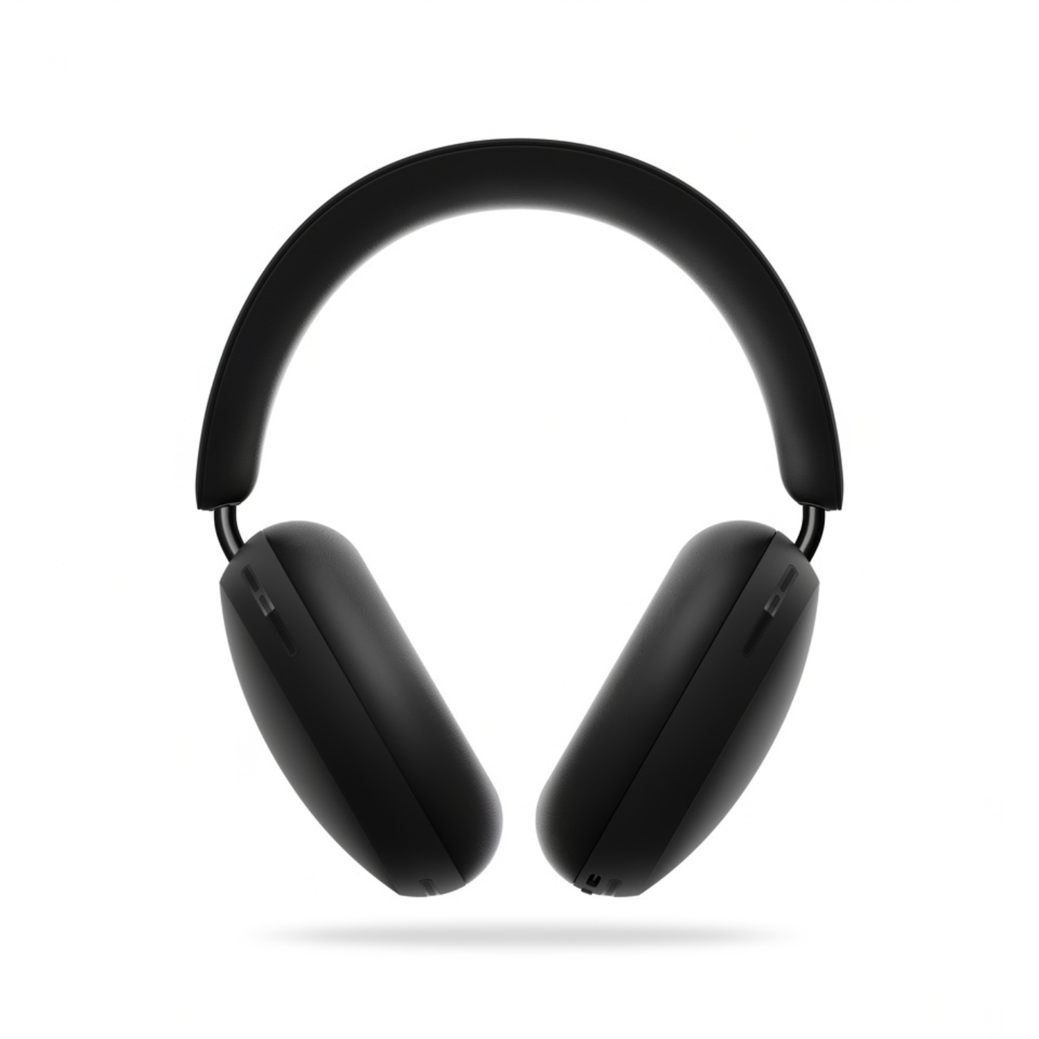 Auriculares negros sobre fondo blanco, vista cenital. Los auriculares son Apple AirPods Max.