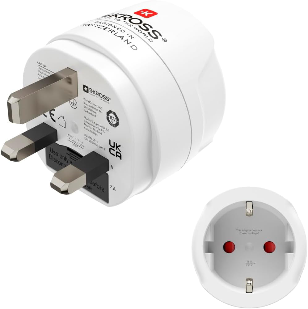 Adaptador de viaje, blanco, con enchufe del Reino Unido y múltiples opciones de enchufe internacional.
