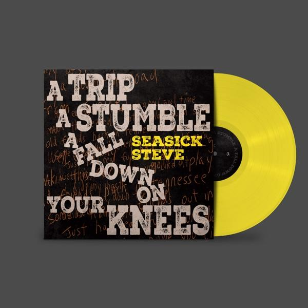Album borító: 'A Trip a Stumble a Fall Down on Your Knees' Seasick Steve-től. Sárga bakelit a borító mellett, szürke háttérrel.