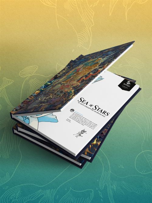 Un libro con ilustraciones coloridas, abierto en una página con texto y una firma.
