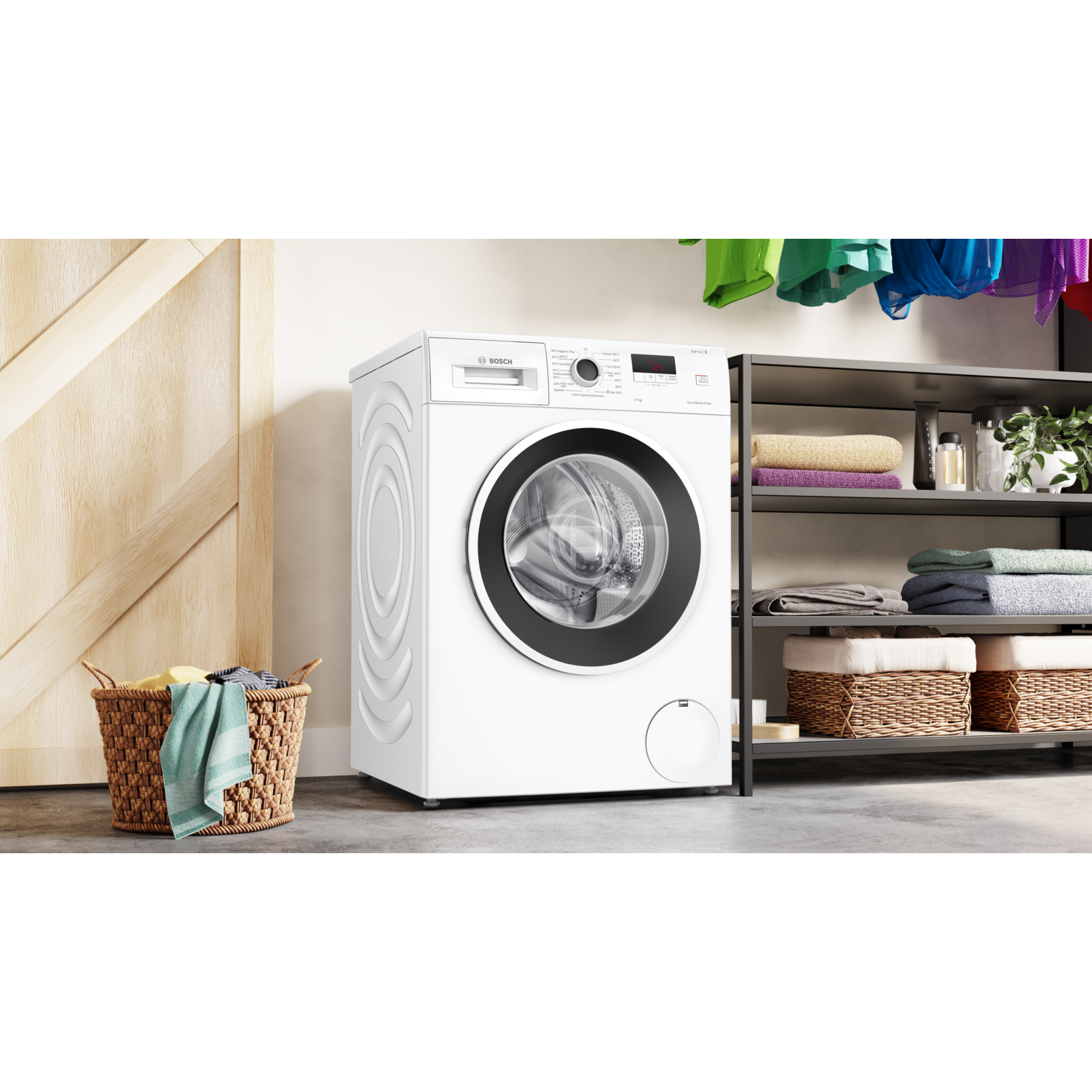 White washing machine in a laundry room with a basket and a shelf.