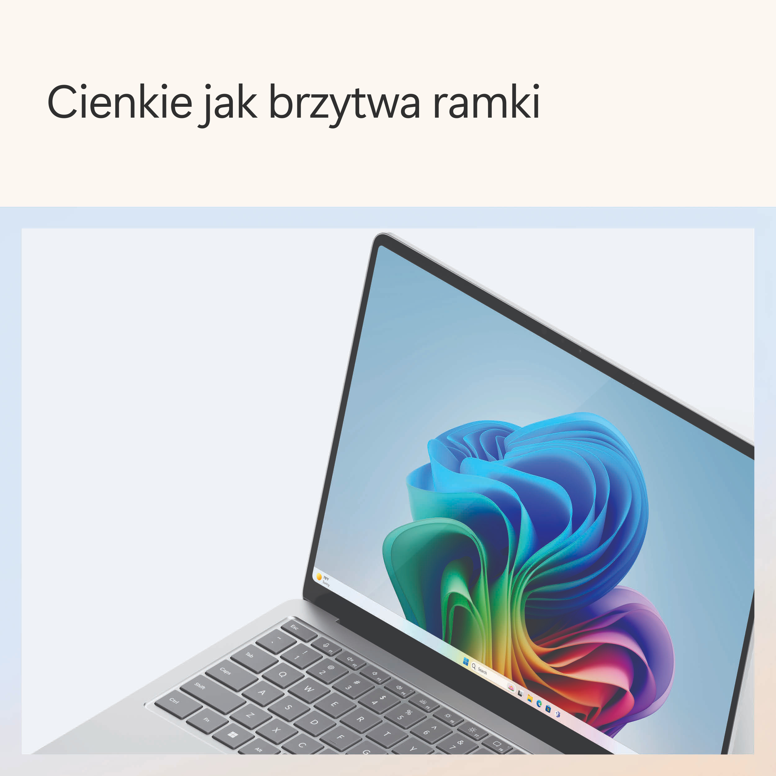Laptop wyświetlający kolorowy kwiatowy wzór na ekranie. Tekst po polsku.