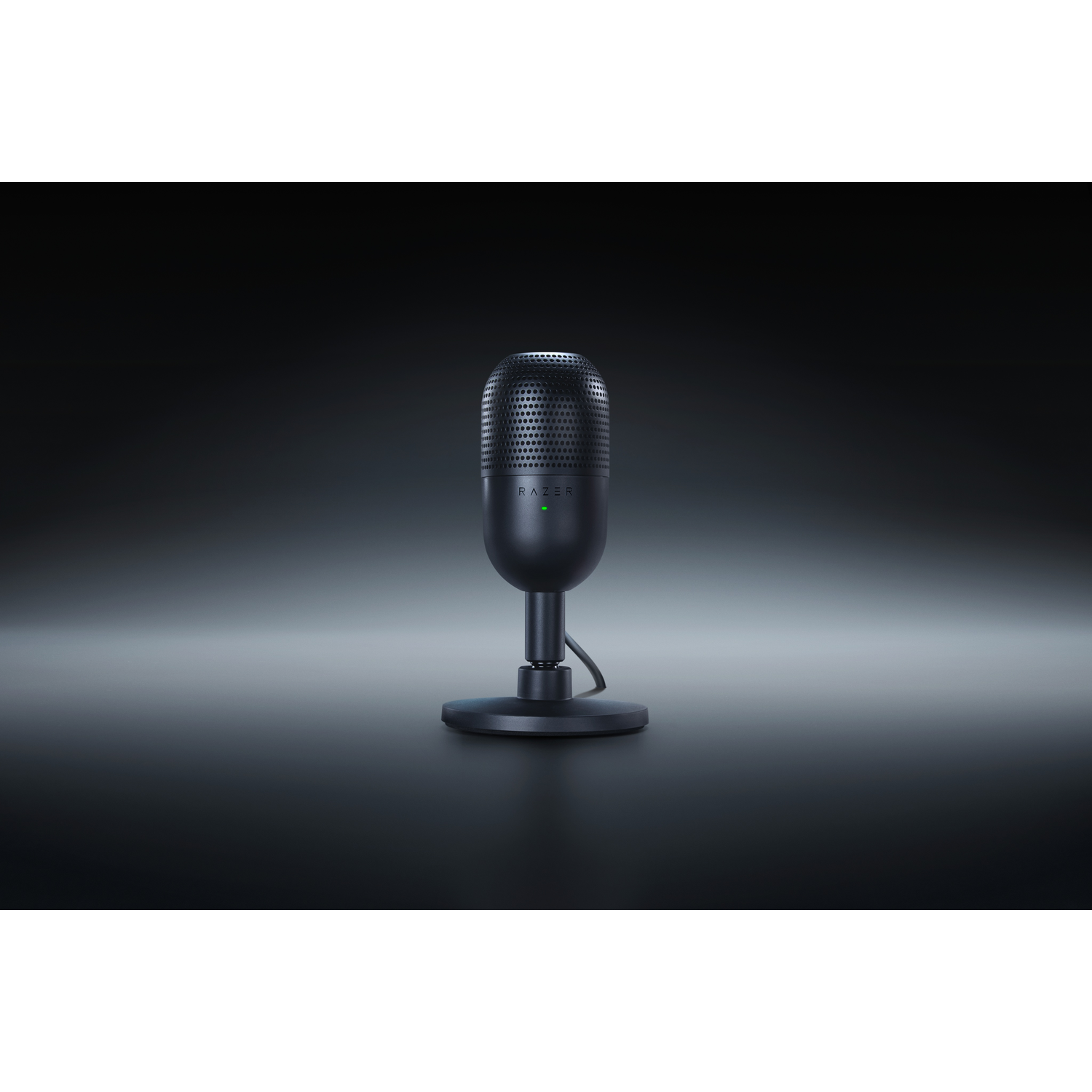 Black Razer microphone on a stand, green light on the front, set against a dark background.