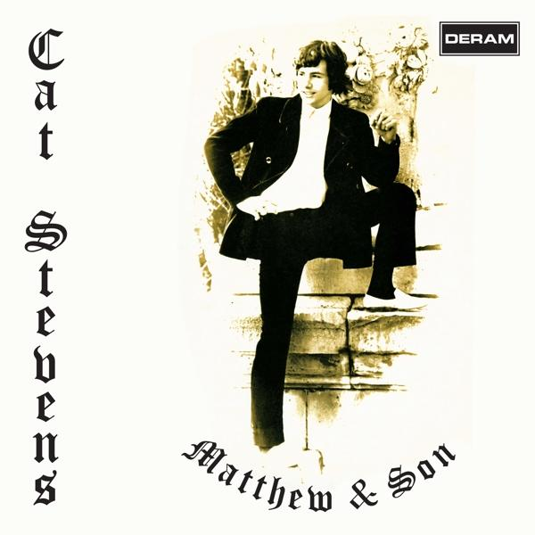 Cat Stevens album borító, fal előtt áll, fehér ing, fekete dzseki.