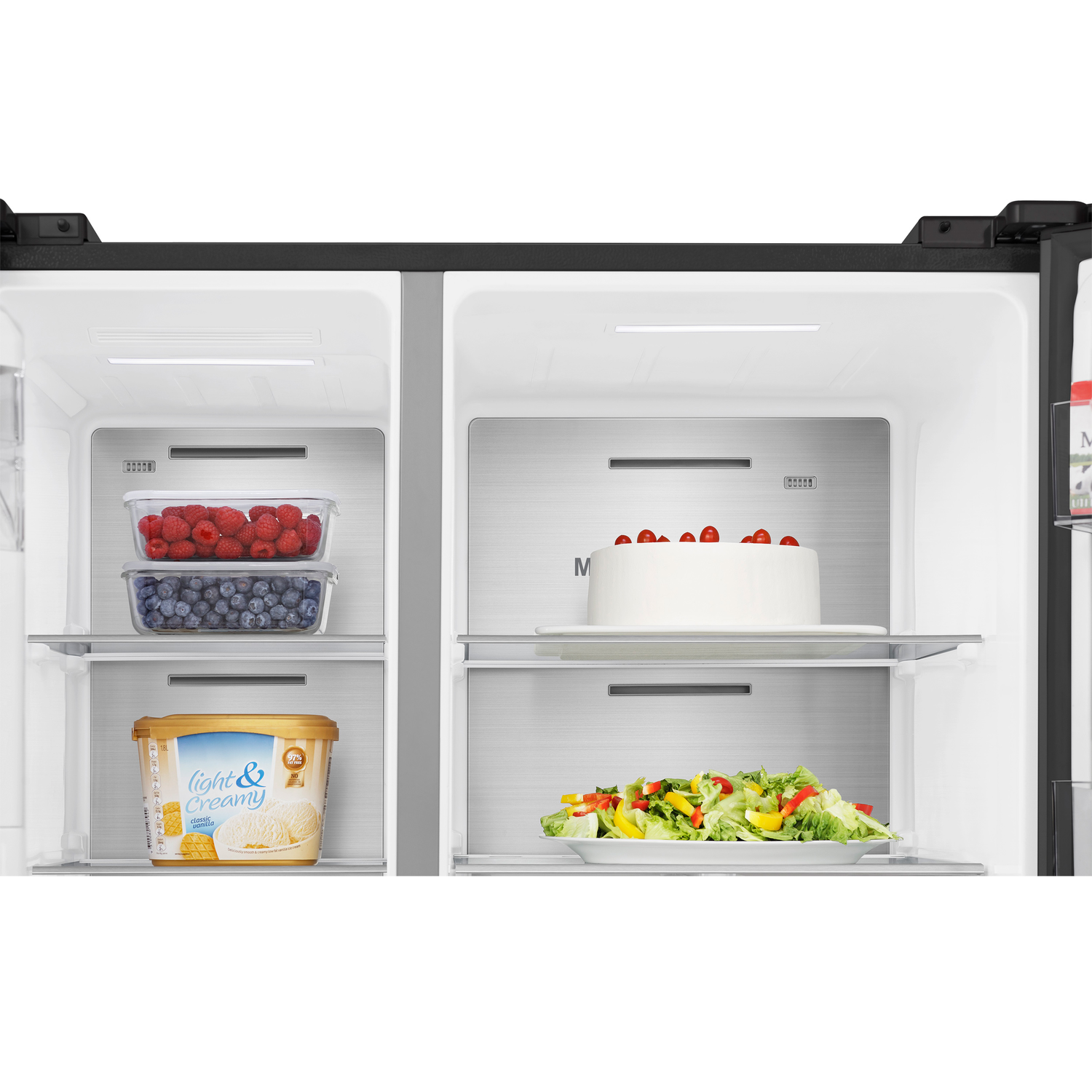 Refrigerator interior with shelves holding food items: berries, cake, salad, and ice cream.