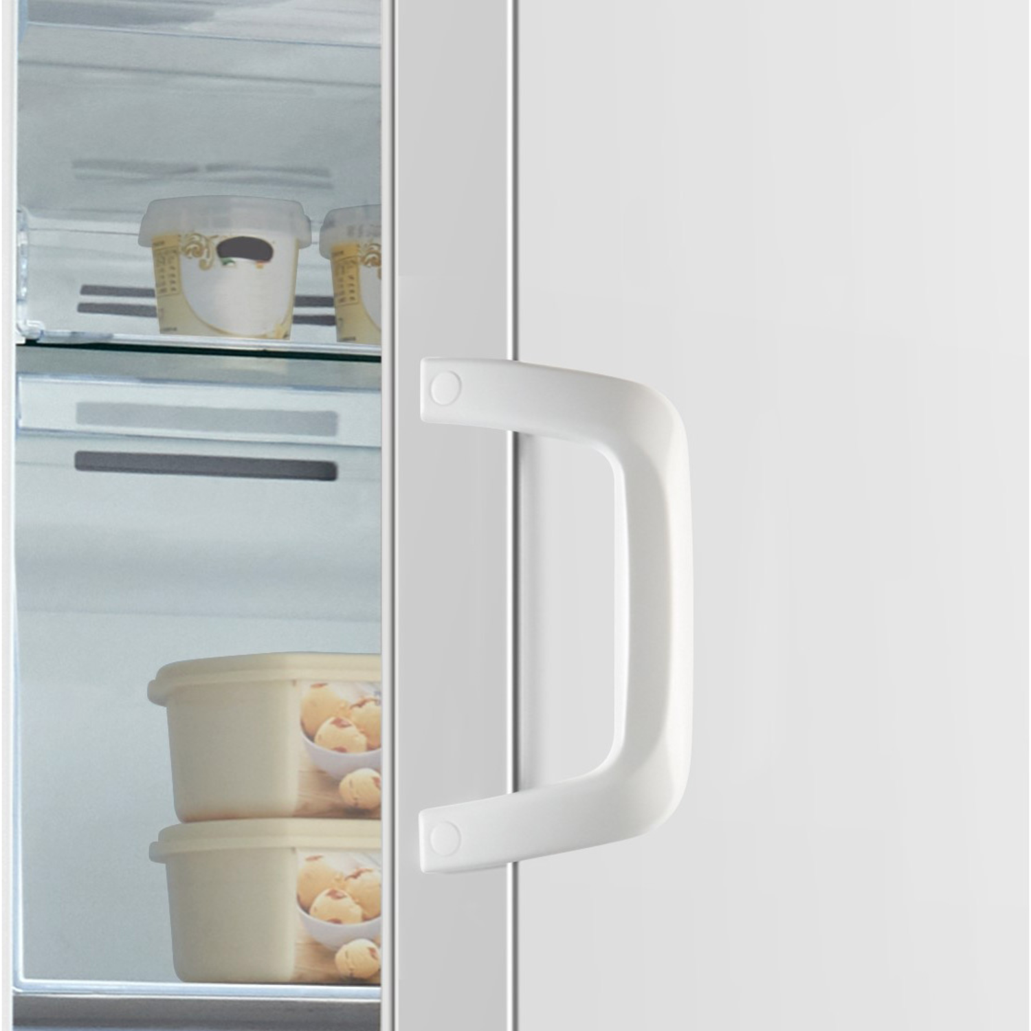 A close-up of a refrigerator handle, showing the door and ice cream inside.
