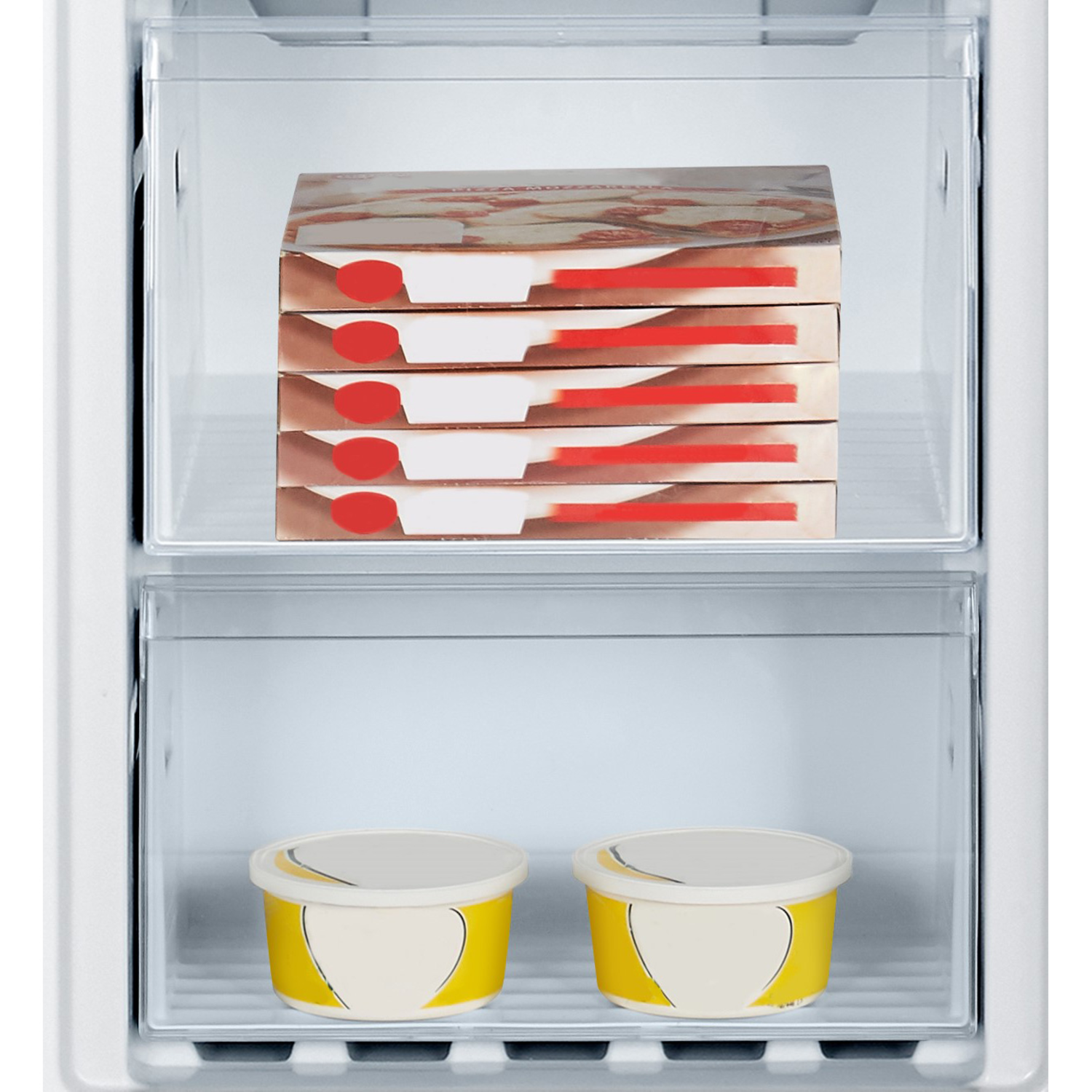 Inside a freezer, there are stacked boxes of food and two yellow containers.