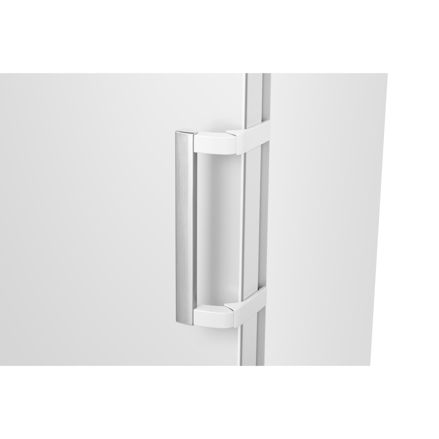 Stainless steel handle on a white refrigerator door, angled view.