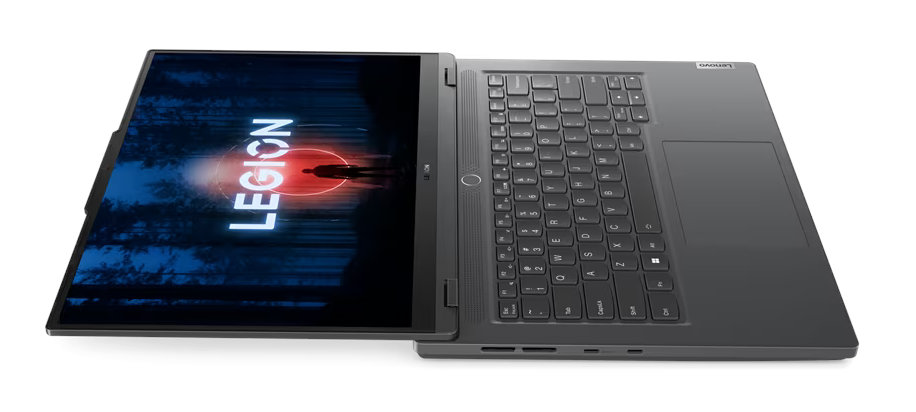 Laptop otwarty, pokazujący logo Legion na ekranie, kolor czarny i szary.