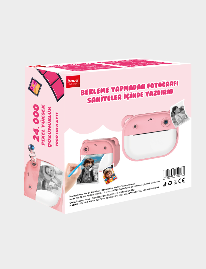 Bir kutuda pembe bir anında fotoğraf makinesi. Kutunun üzerindeki metin '24.000 piksel yüksek çözünürlük' ve 'Anında fotoğraf yazdırın'.