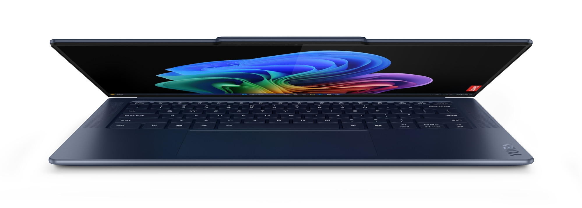 Ciemnoniebieski laptop Lenovo Yoga jest otwarty, wyświetlając kolorowy abstrakcyjny obraz. Klawiatura i ekran są widoczne.
