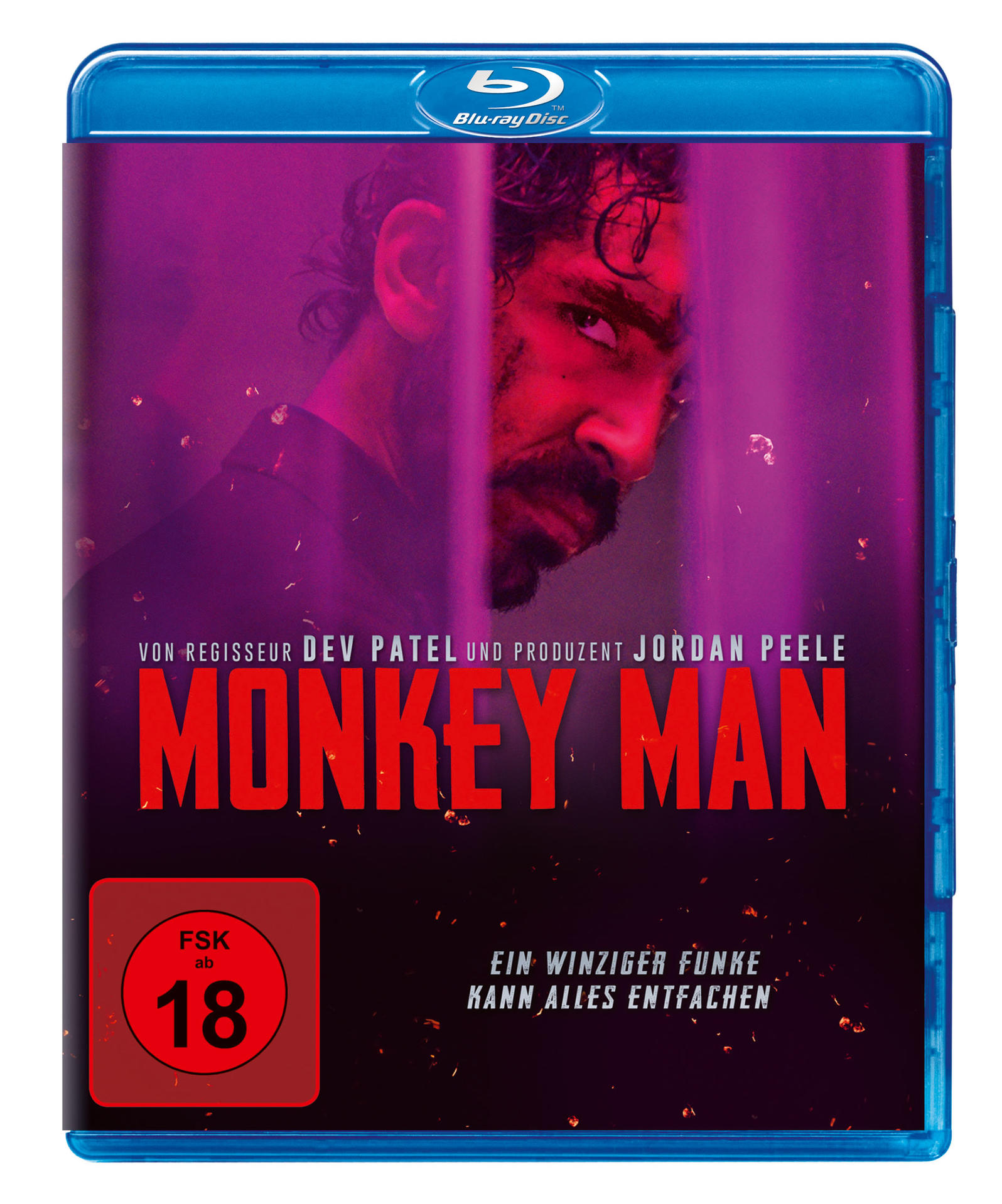 DVD-Cover von 'Monkey Man', mit einem Männergesicht in einem lilafarbenen Hintergrund. Der Titel ist rot.