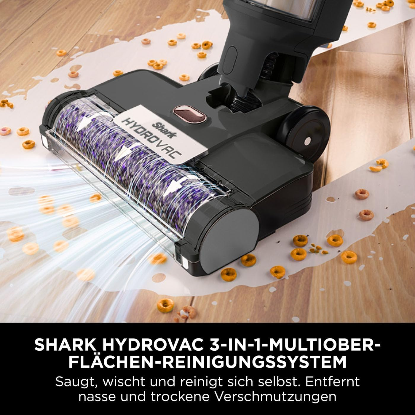 Aspirateur Shark Hydrovac nettoyant des céréales renversées sur le sol.
