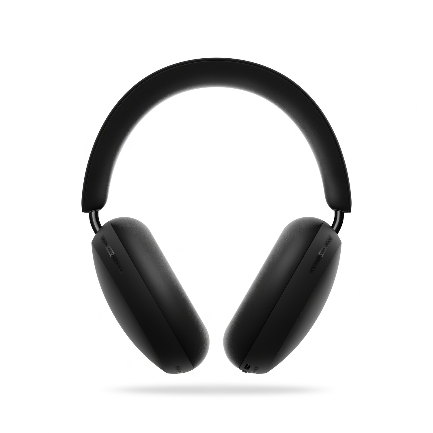 Black over-ear headphones, viewed from the front, isolated on white.