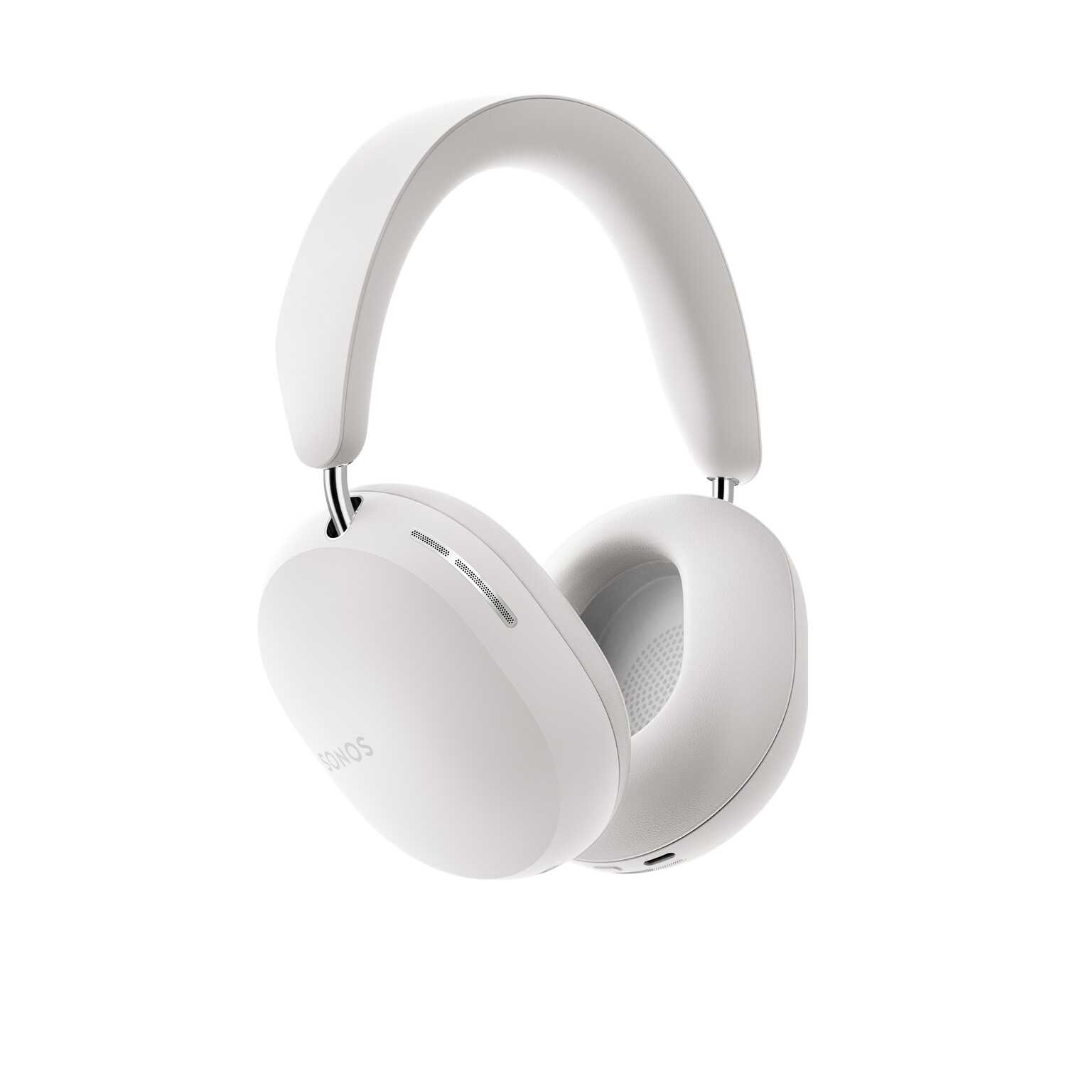 White headphones on a black background. The headphones have a curved headband and earcups.