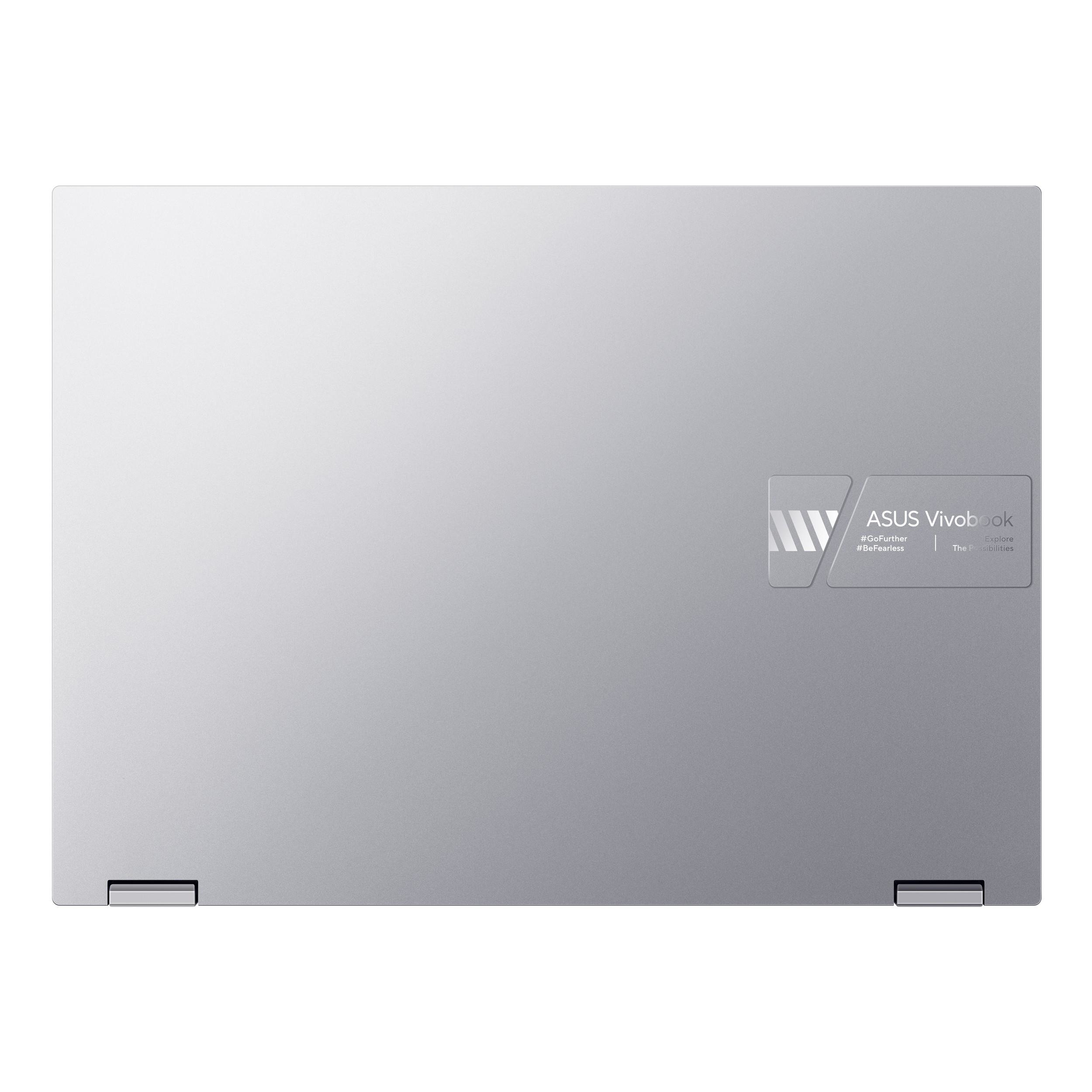 Parte trasera del portátil ASUS Vivobook plateado con logotipo y texto.