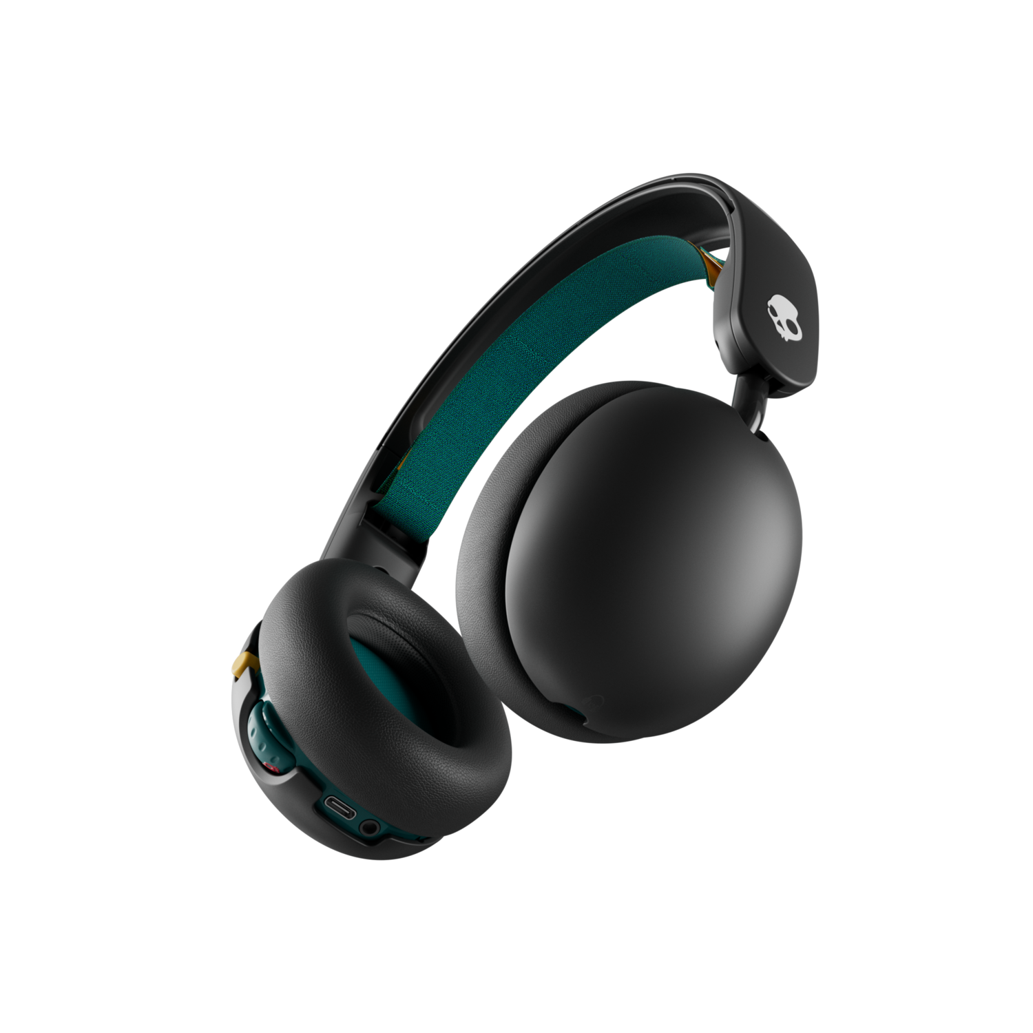 Black headphones with green and teal accents, skull logo, on a black background. Earcups are large and padded.