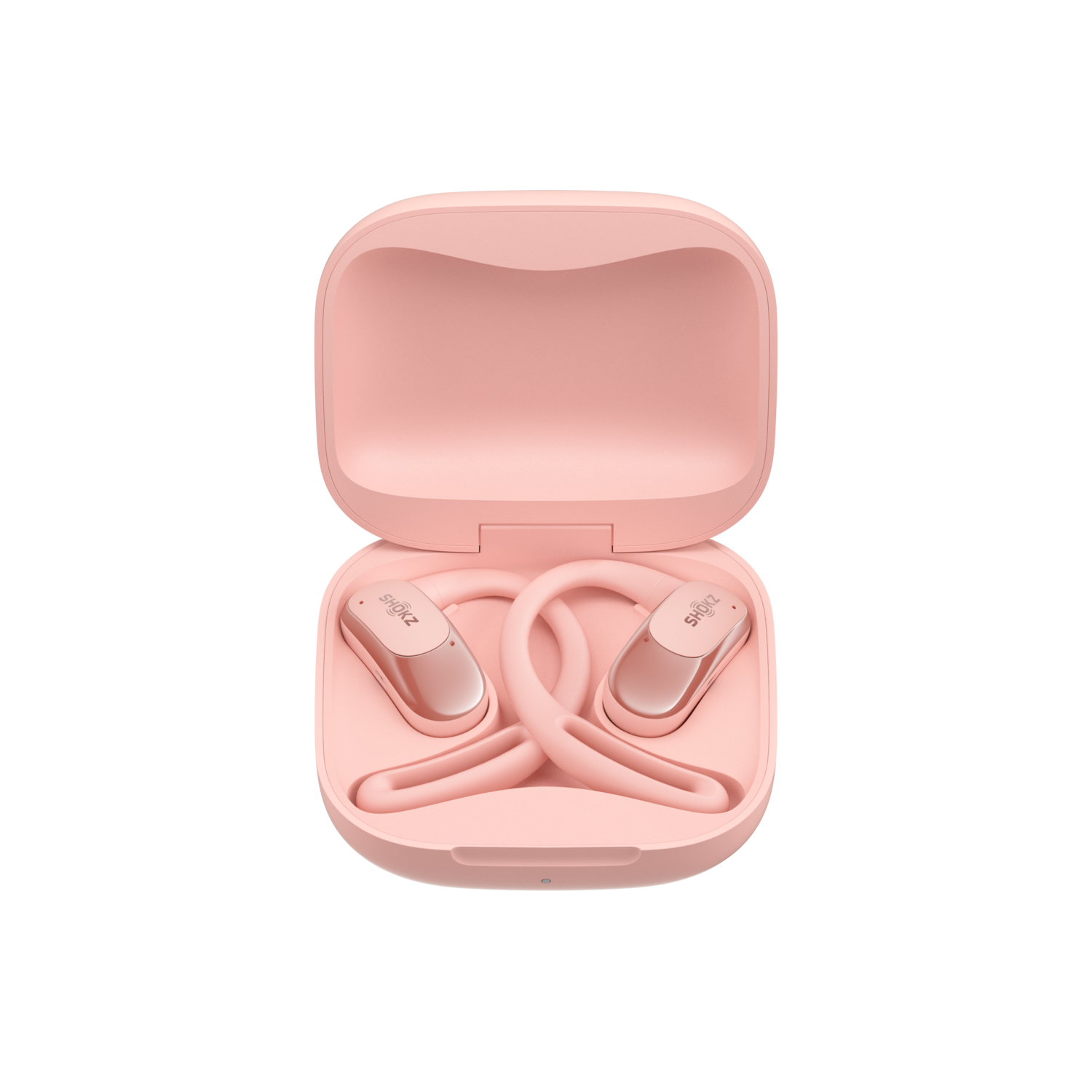 Pink Shokz wireless headphones inside a matching pink case.