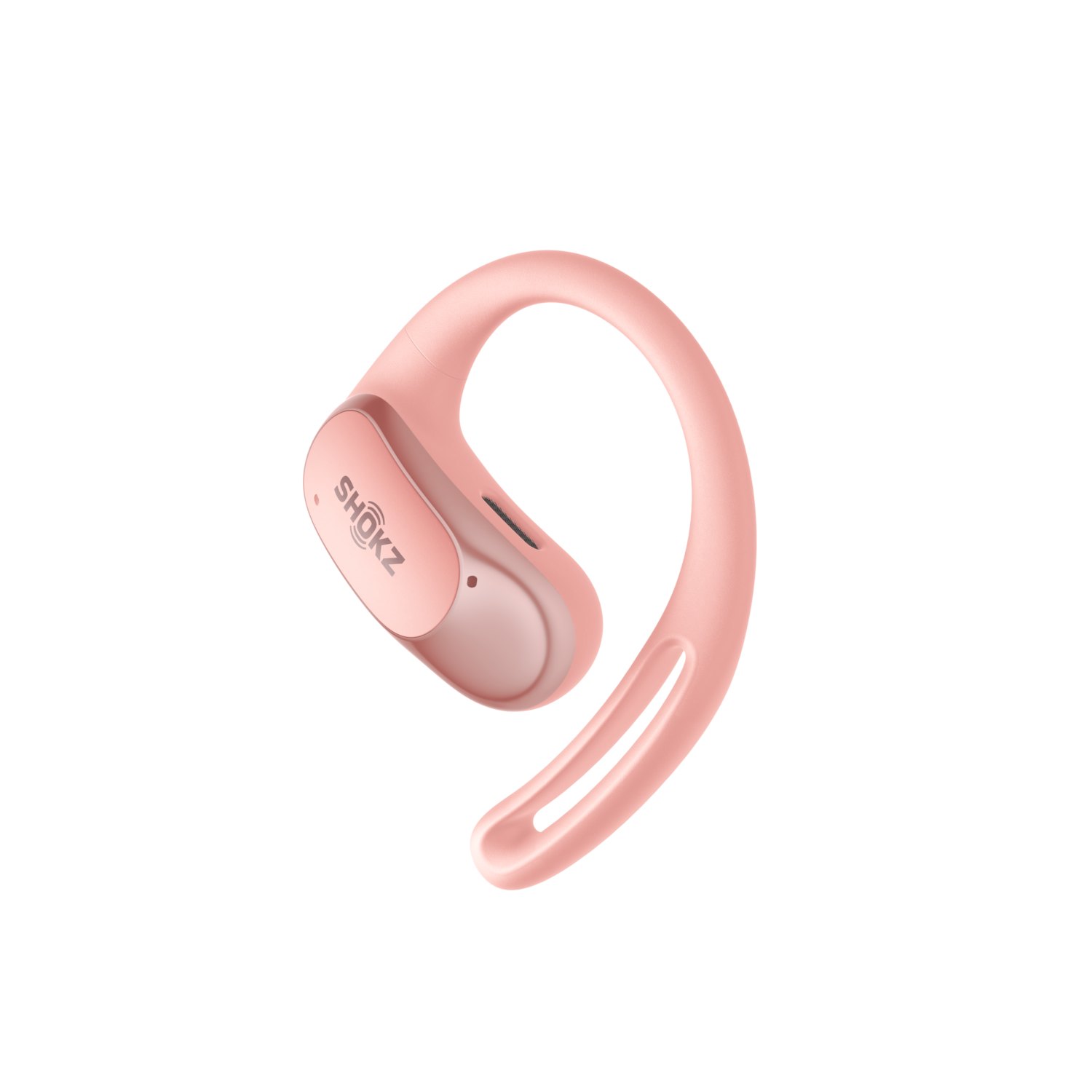 Pink Shokz wireless earbud. Curved design, ear hook, and Shokz branding. Black background.