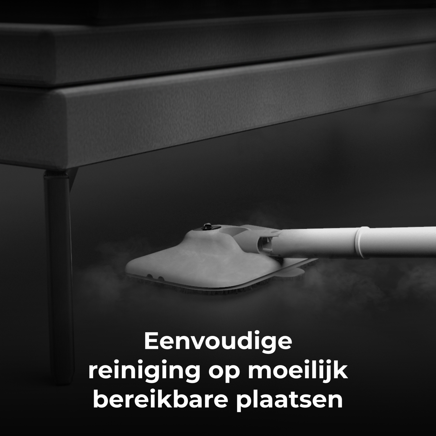 A steam cleaner is cleaning under a black table, removing the dust.