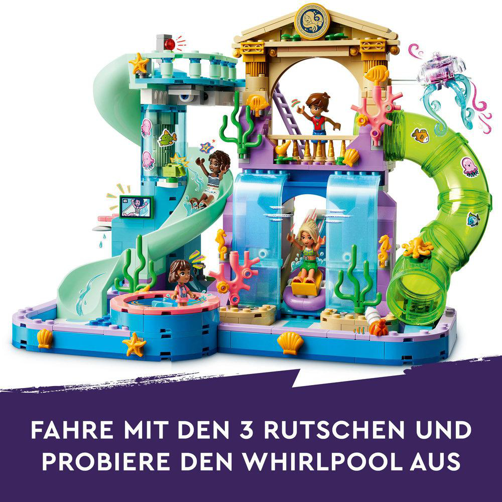 Ein Lego-Set mit Figuren, die auf Rutschen und in einem Pool spielen, in einer farbenfrohen Wasserpark-Umgebung.
