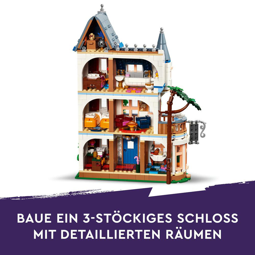 Ein Lego-Haus mit vielen Zimmern wird gezeigt. Text unten: BAUE EIN 3-STÖCKIGES SCHLOSS.
