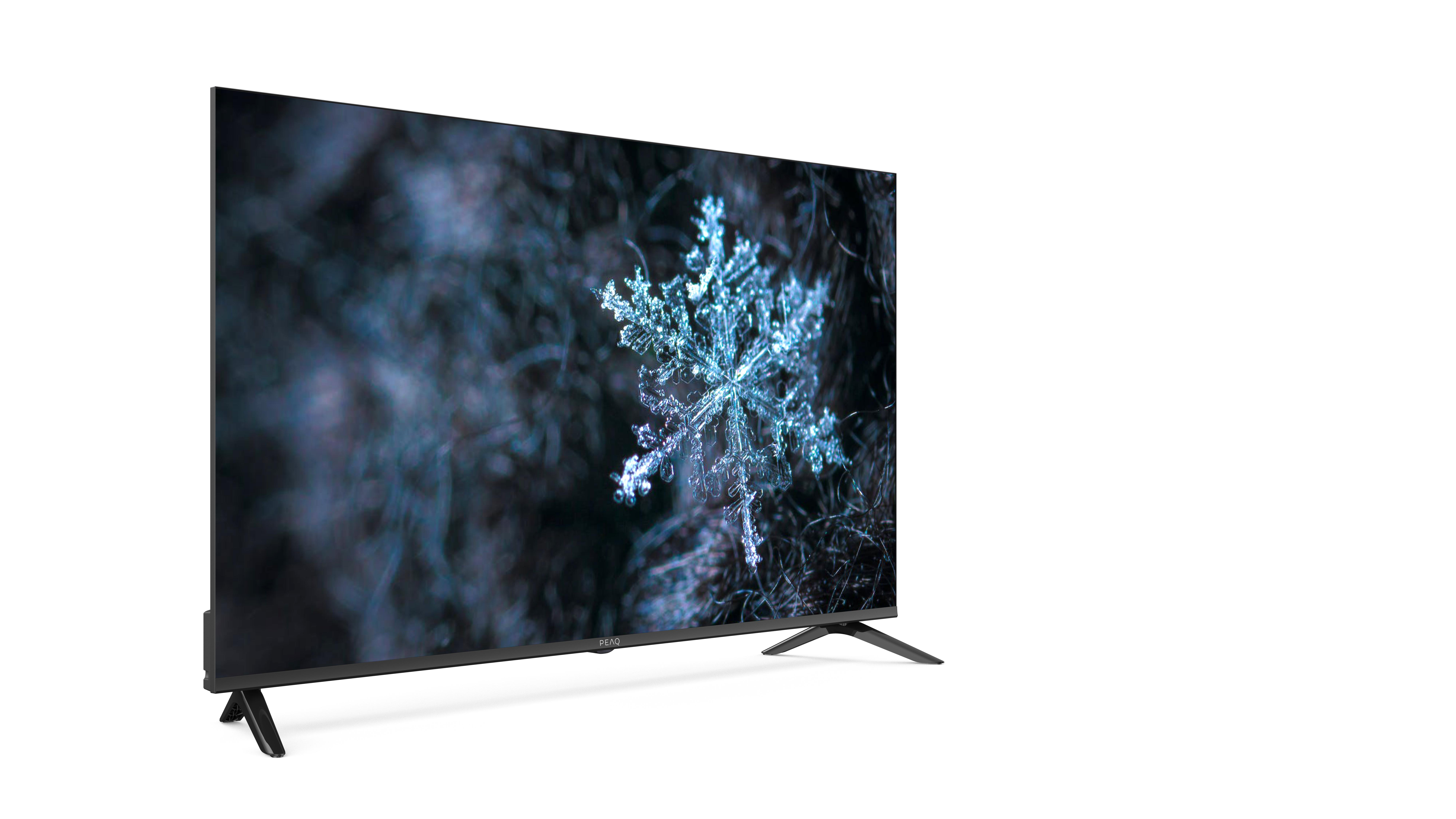 Ein Fernsehbildschirm zeigt eine Nahaufnahme einer Schneeflocke. Der Fernseher hat einen schwarzen Rahmen.