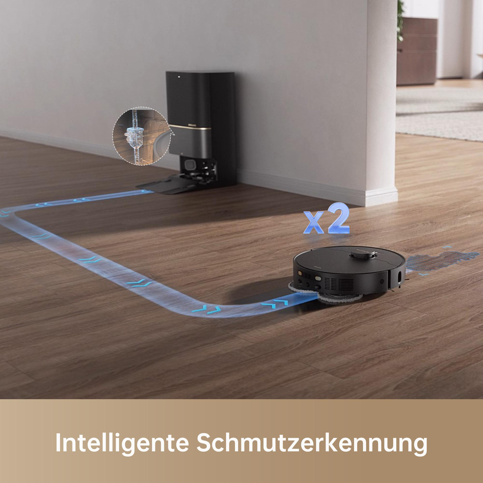 Ein Roboter-Staubsauger auf einem Holzboden. Dahinter eine Dockingstation, mit blauem Pfad.